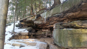 Rock shelter snow